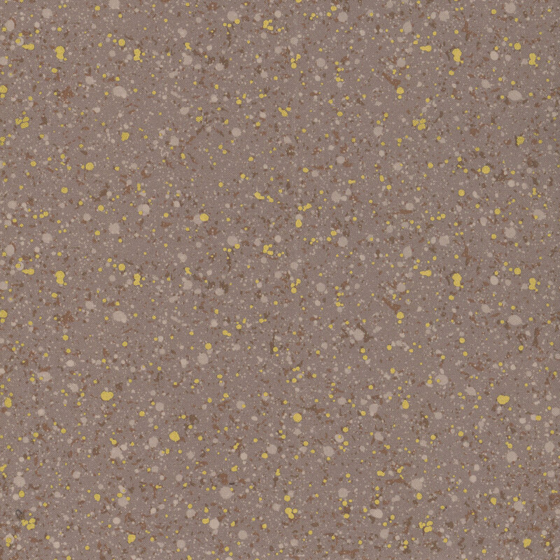This fabric features a dark brown and gold metallic splatter pattern on a taupe background