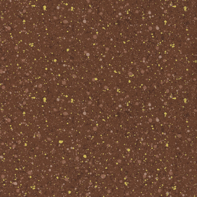 This fabric features a dark brown and gold metallic splatter pattern on a warm rich brown fabric.