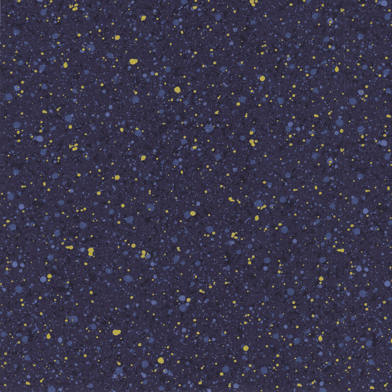 This fabric features a dark blue and gold metallic splatter pattern on a dark navy background.