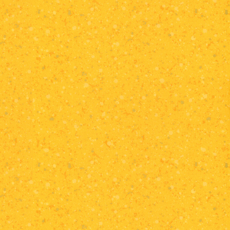 This fabric features dark yellow and metallic splatter pattern on a bright yellow background.