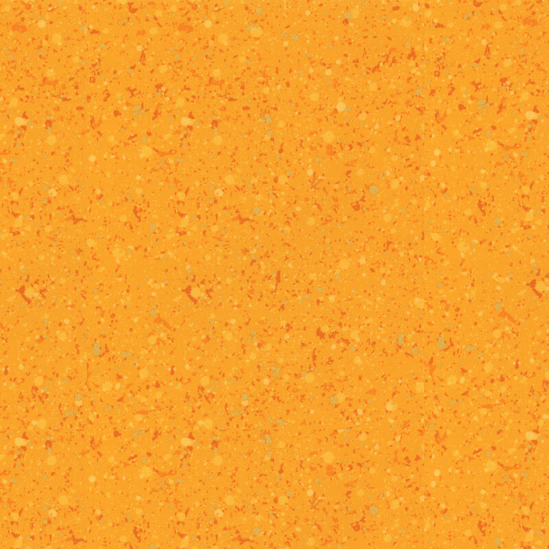 This fabric features orange and metallic splatter pattern on a golden yellow background.