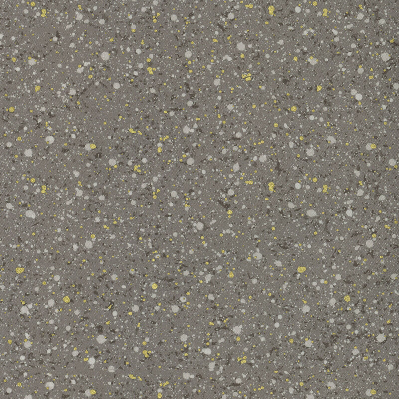This fabric features gray and metallic gold splatter pattern on a dark gray background.