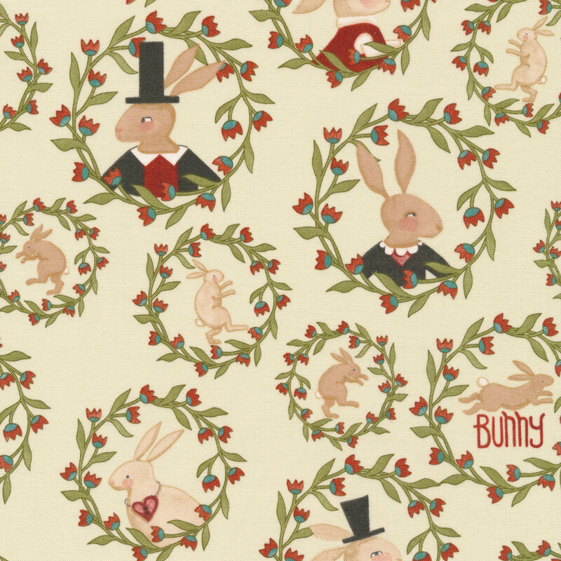 This fabric features wreath motifs with bunny portraits on a cream background
