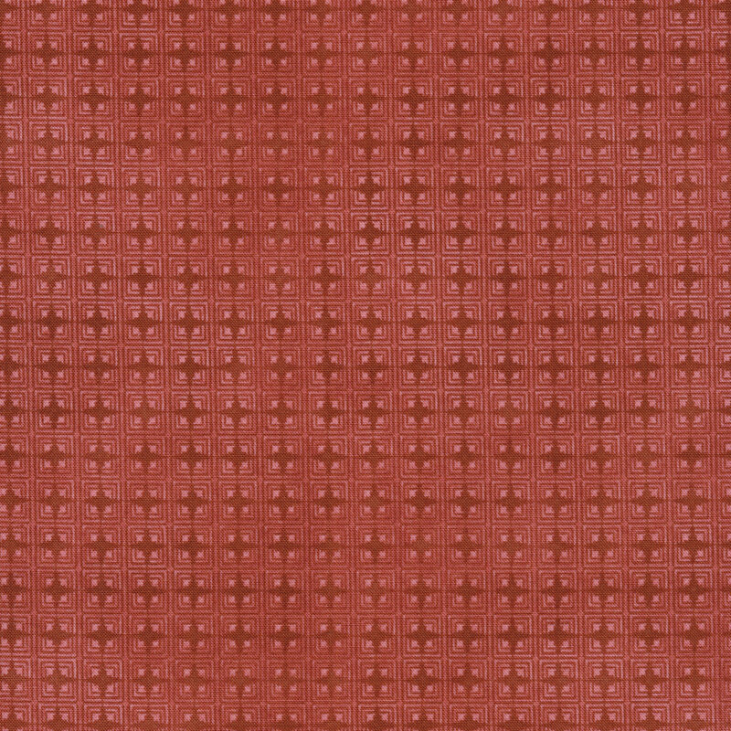 This fabric features red and dark red tonal geometric pattern of squares and diamonds.