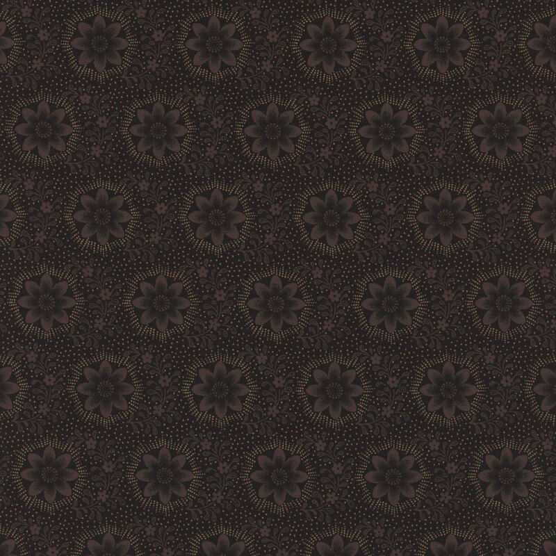 Black fabric with rows of faint circular dark brown florals and vines all over