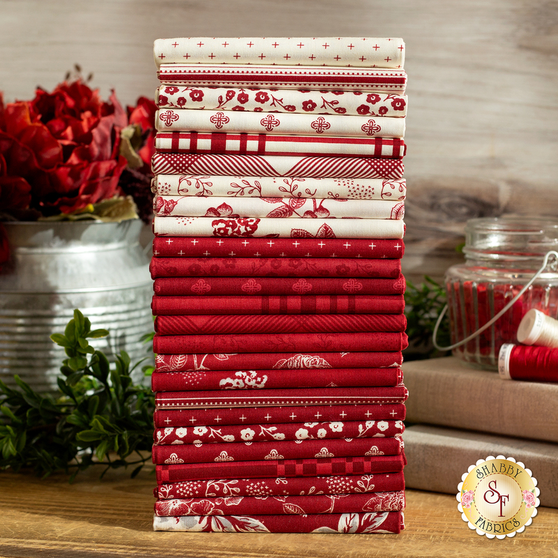 photo of a stack of all fabrics included in Heirloom Red collection
