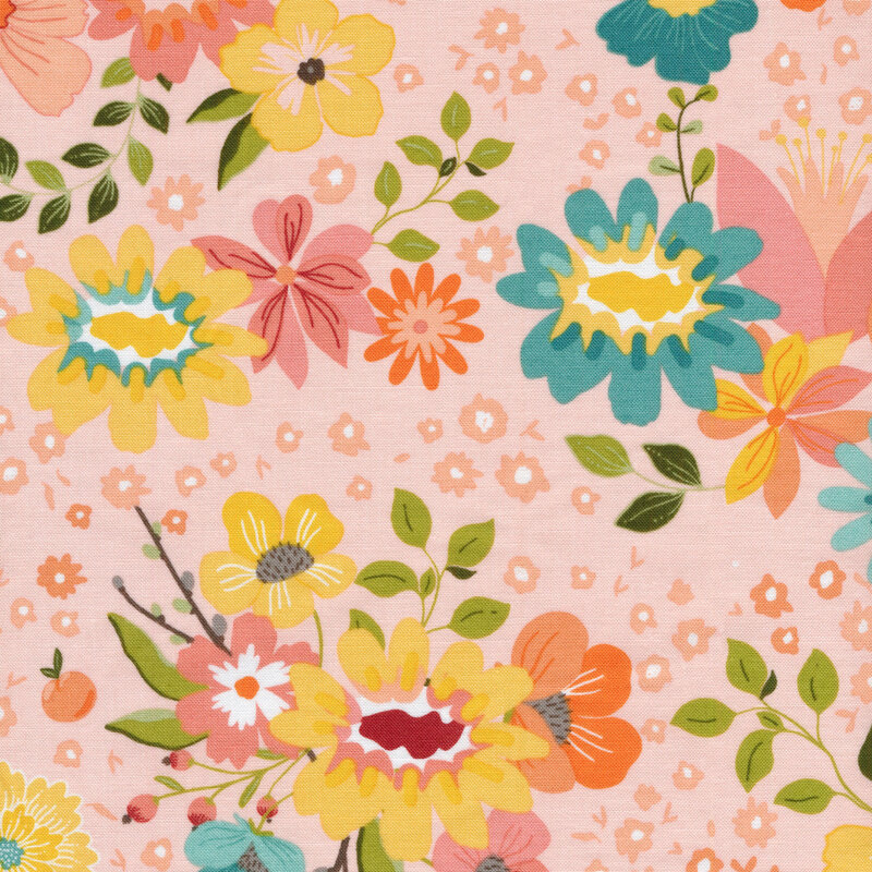 peach colored fabric with scattered multi colored flowers and green leaves scattered across it