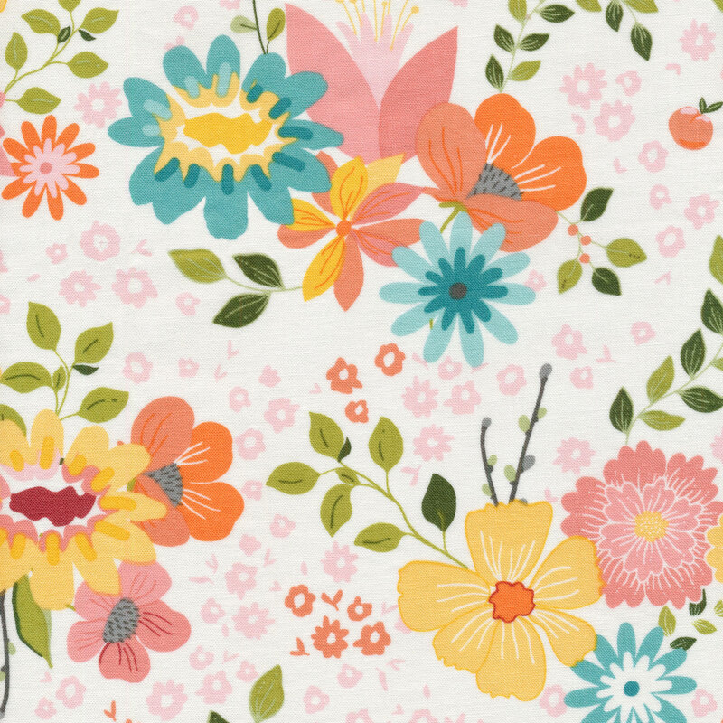 Cream colored fabric with scattered multi colored flowers and green leaves scattered across it