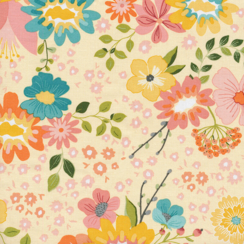 Light yellow colored fabric with scattered multi colored flowers and green leaves scattered across it