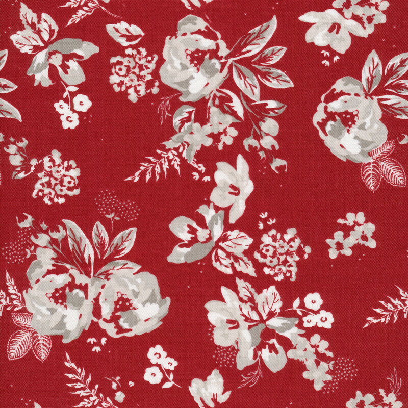 This fabric features bundles of white and light gray flowers and leaves on a red background. 