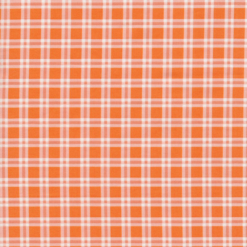 orange fabric with white and orange plaid