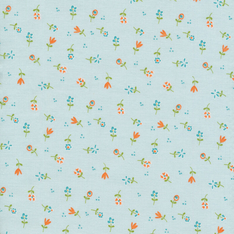 pale pastel blue fabric with scattered orange and blue flowers and tiny dots