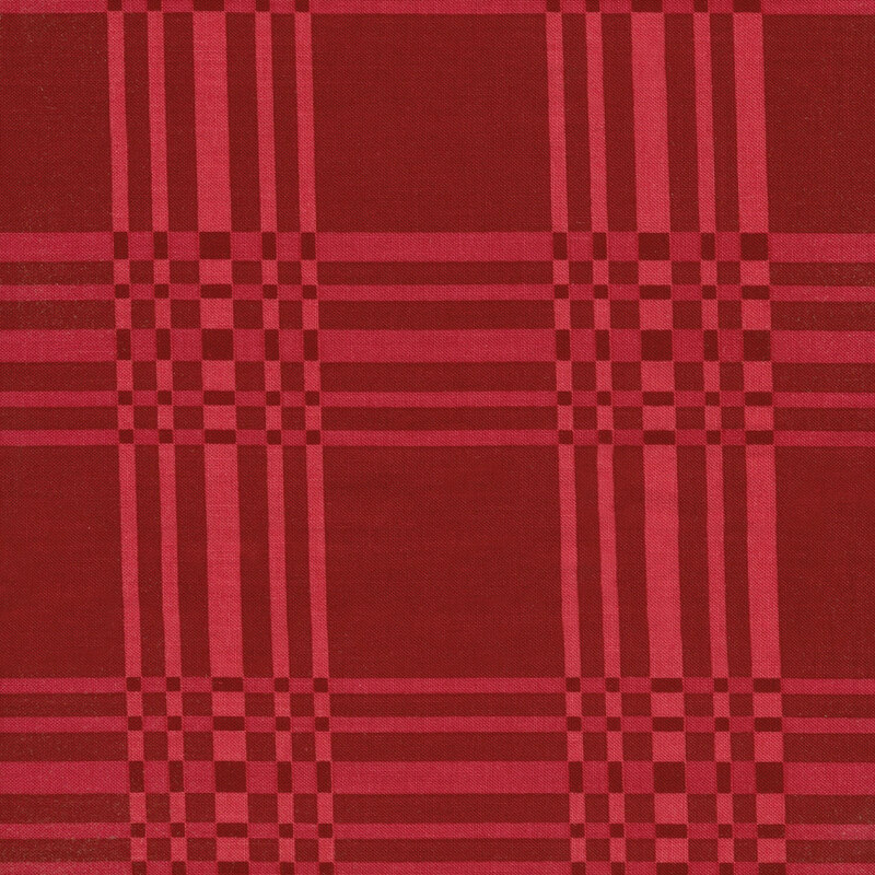 This fabric features a red and light red plaid pattern on a darker magenta background.