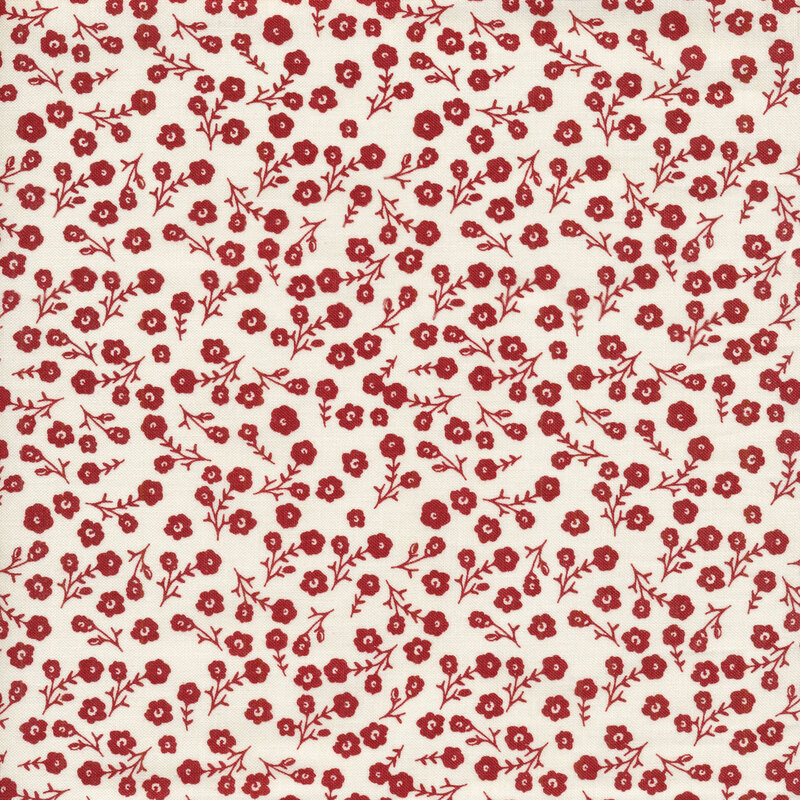 This fabric features tossed red flowers with stems on a solid cream background.