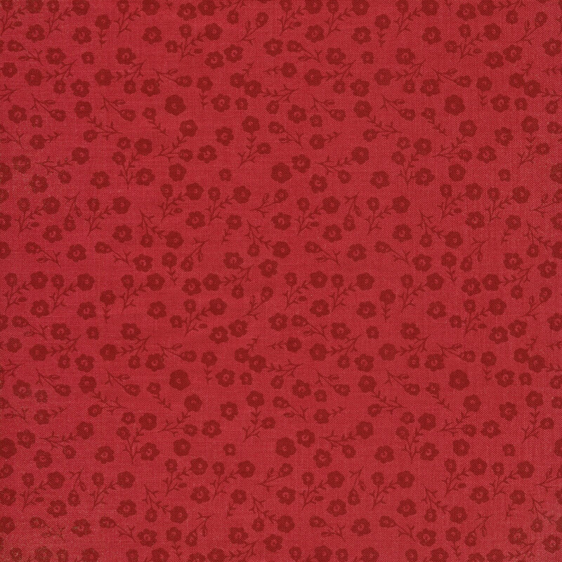 This fabric features tossed dark red flowers with stems on a red background.