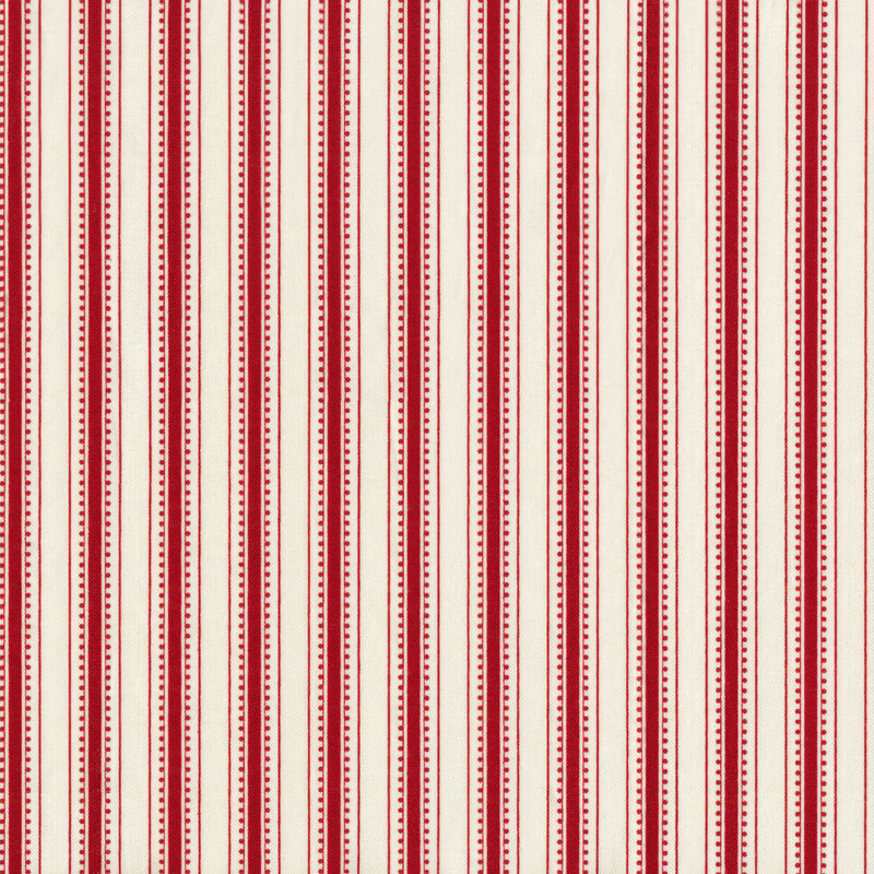This fabric features red stripes on a cream background