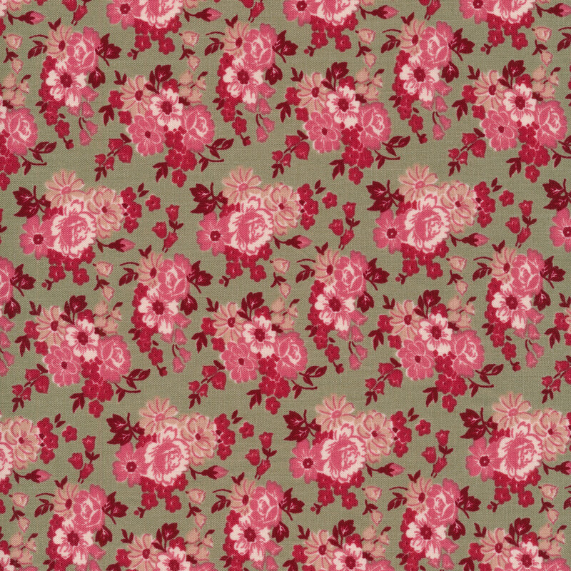 This fabric features tonal pink flower clusters on a gray background.