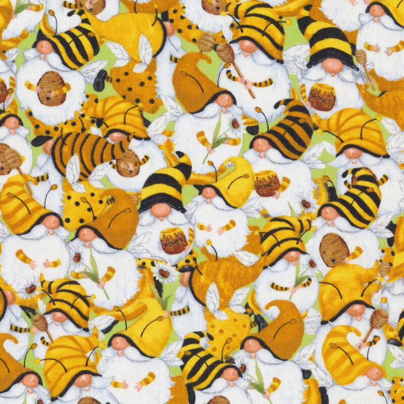 This fabric features gnomes dressed as bees packed on a light green background.