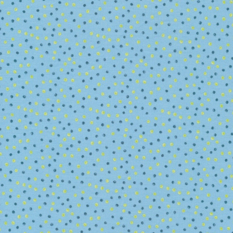 This fabric features dark blue and lime green watercolor dots on blue background