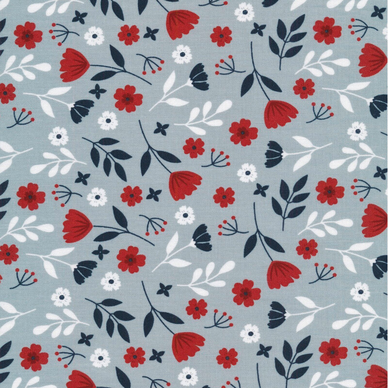 Digital image of gray blue fabric featuring tossed flowers and sprigs of leaves in midnight blue, bright red, and white