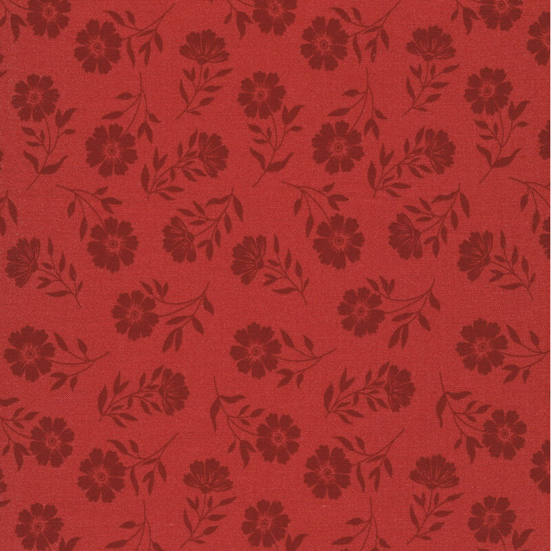 Red fabric with tossed and tonal florals.