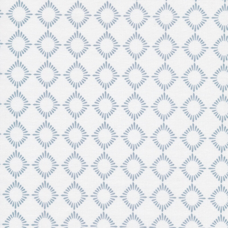 white fabric featuring gray blue geometric diamond shapes