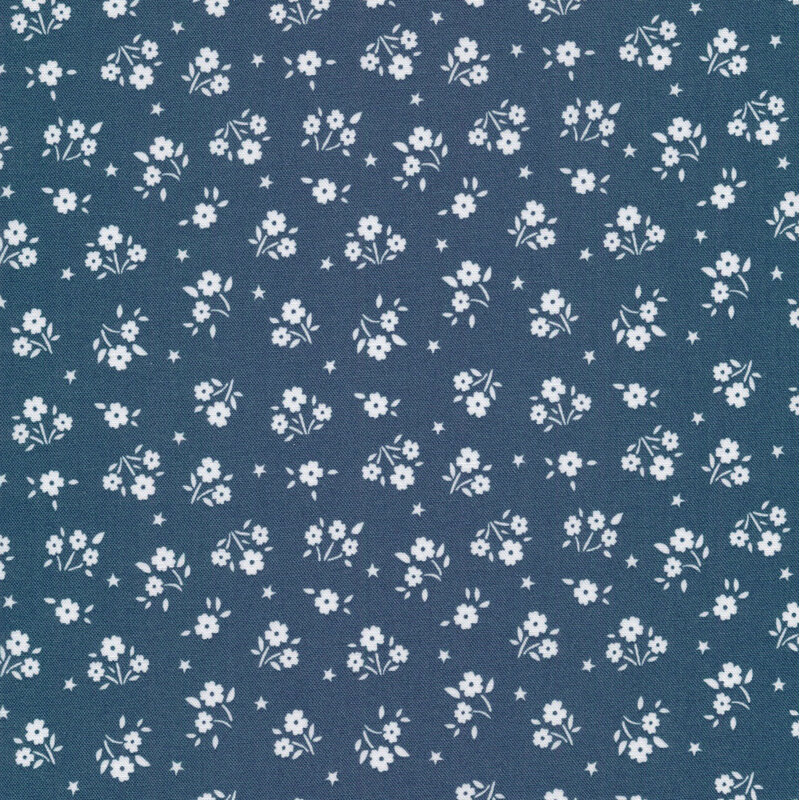 navy fabric featuring tiny white flowers and stars