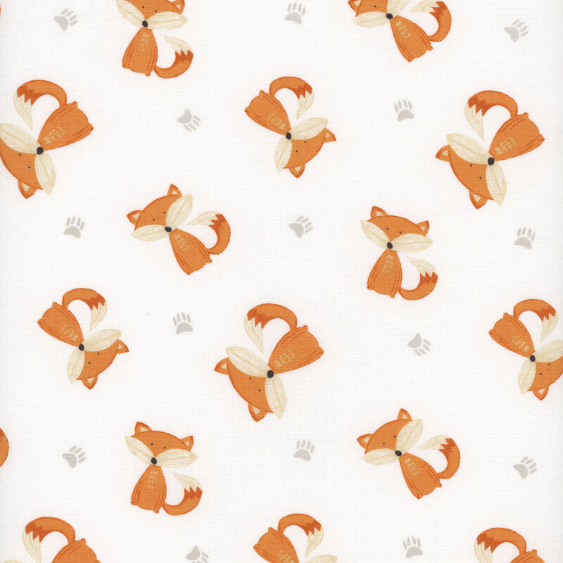 This fabric features tossed sitting foxes on a solid white background with light gray paw prints.
