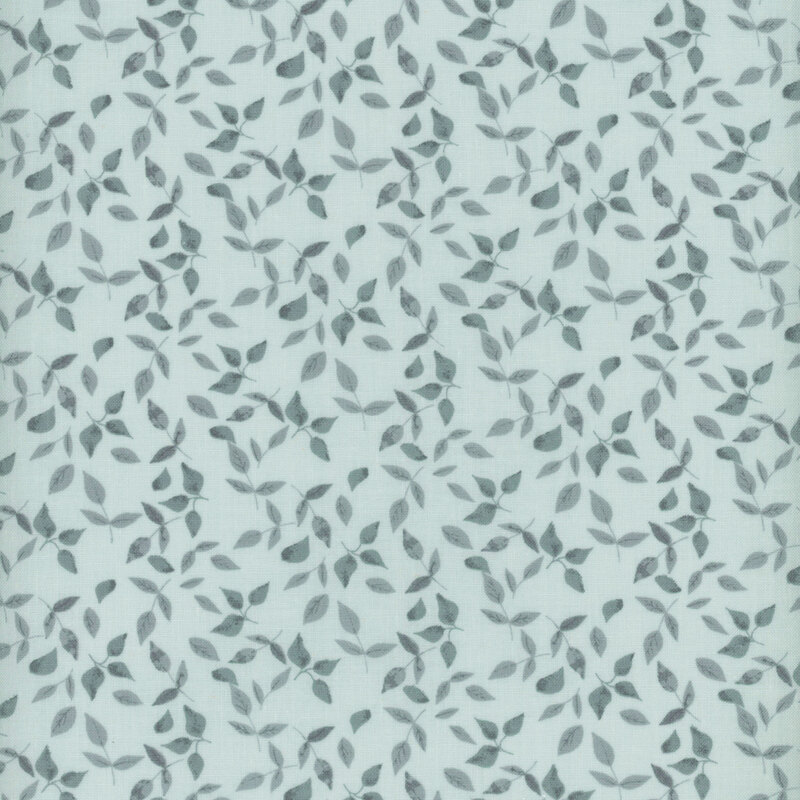This fabric features tossed tonal blue leaves on a solid soft blue background.