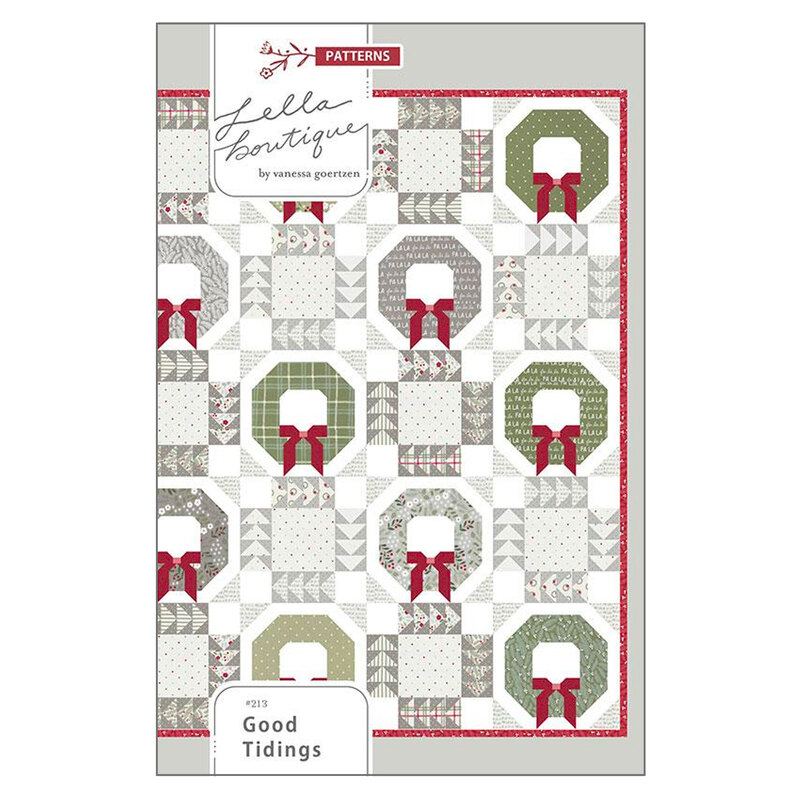 Front of a quilt pattern featuring festive Christmas wreaths