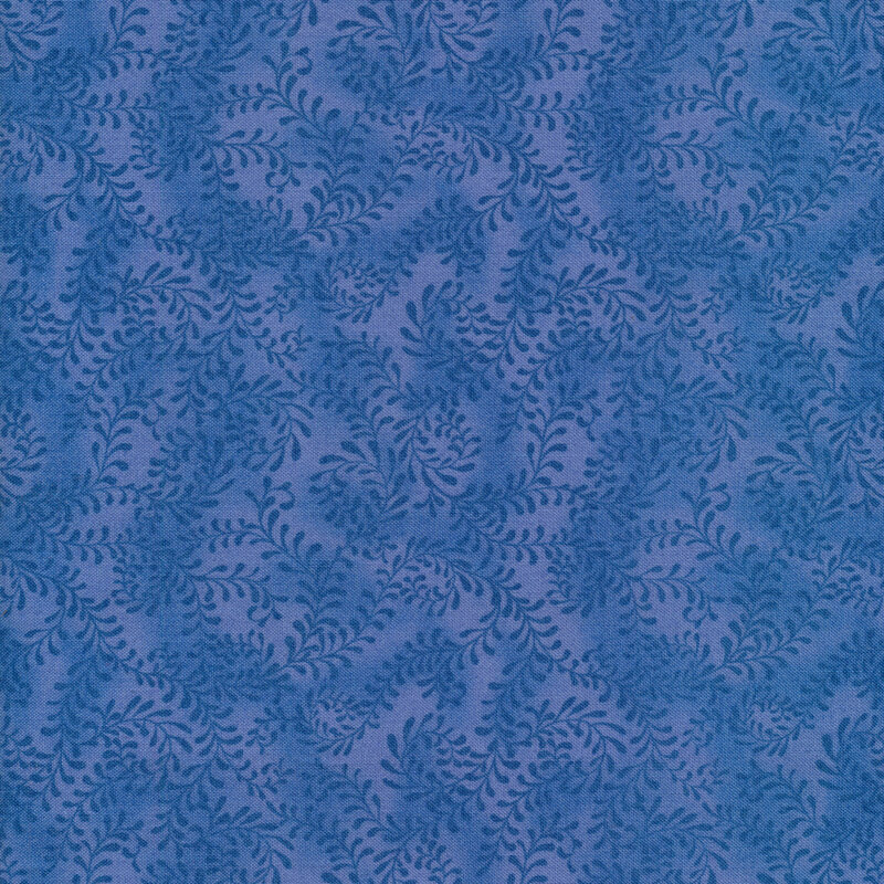 This fabric features a dark blue pattern of swirling leafy vines on a mottled blue background.