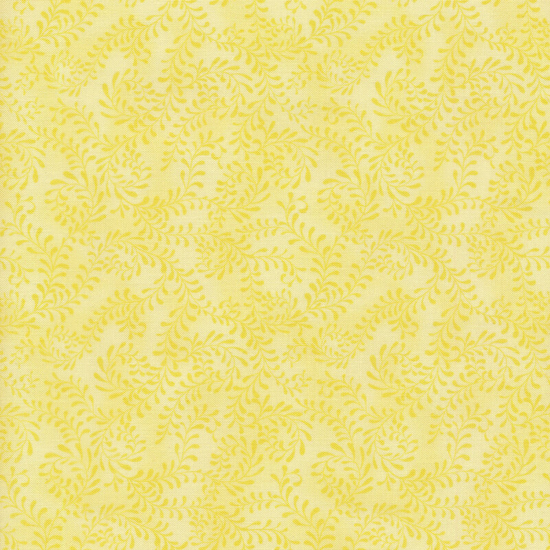 This fabric features a bright yellow pattern of swirling leafy vines on a mottled pastel yellow background.