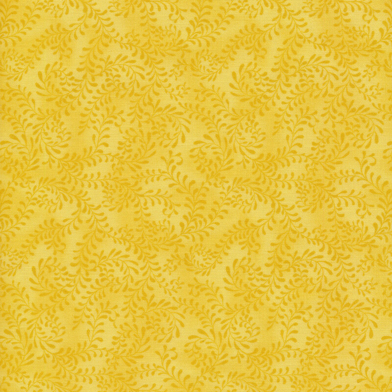 This fabric features a bright lemon yellow pattern of swirling leafy vines on a mottled yellow background.