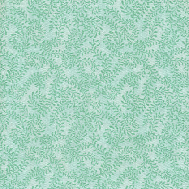 This fabric features a pastel minty aqua pattern of swirling leafy vines on a mottled aqua background.