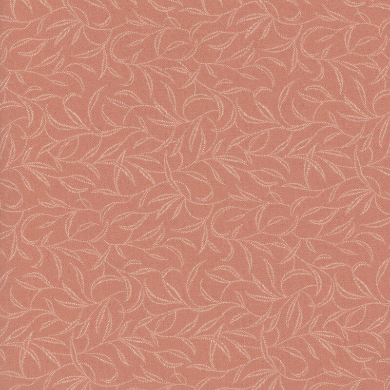 muted pink fabric featuring vines and leaves in a mock embroidery style