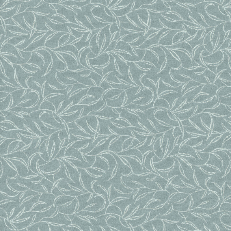 light blue fabric featuring vines and leaves in a mock embroidery style