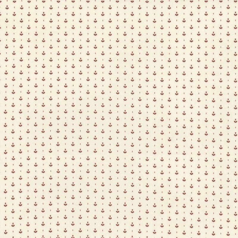 cream fabric featuring dark red abstract tulip designs interspersed with tiny dots