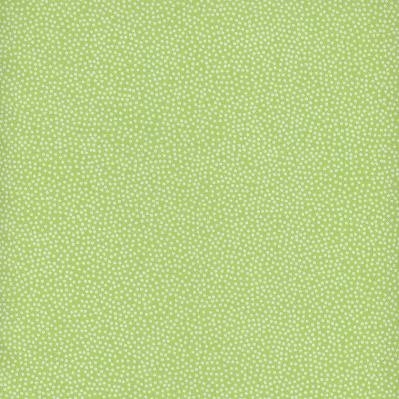 Light green fabric with tiny white dots all over