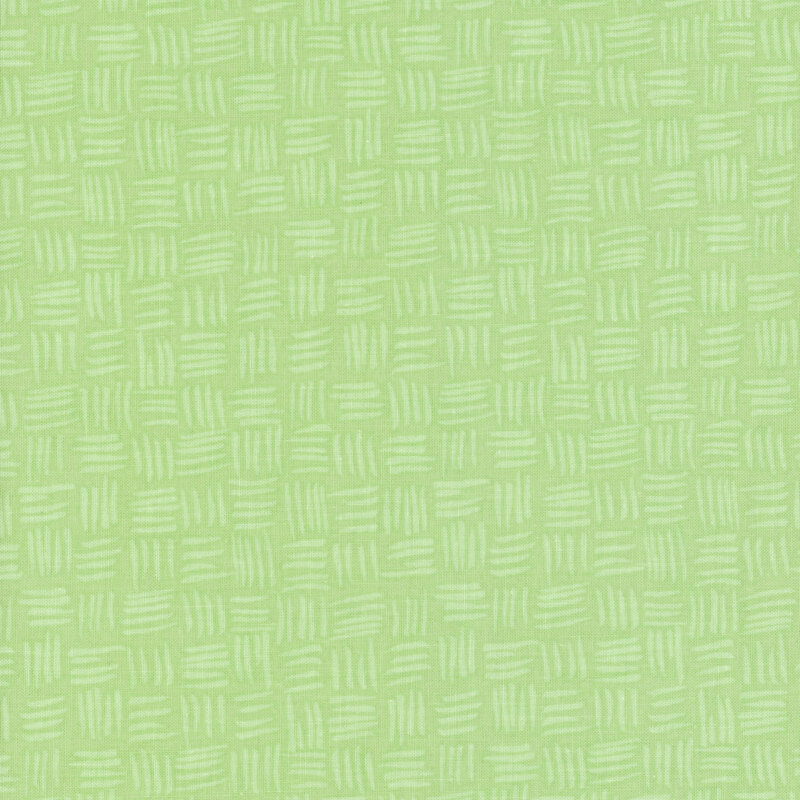 light green fabric featuring a woven print in a tonal green color