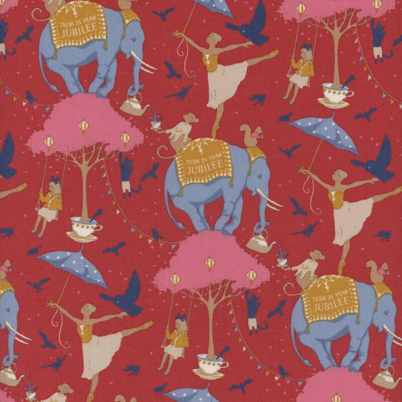 This fabric features animals and ballerinas standing on an elephant, which stands on a cream tree branches with pink leaves.