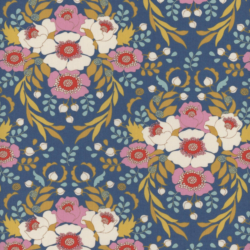 This fabric features cream and light pink flowers with gold and light aqua vines on a bright blue background.