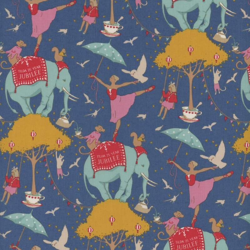 This fabric features animals and ballerinas standing on an elephant, which stands on a golden yellow tree with a bright blue background.