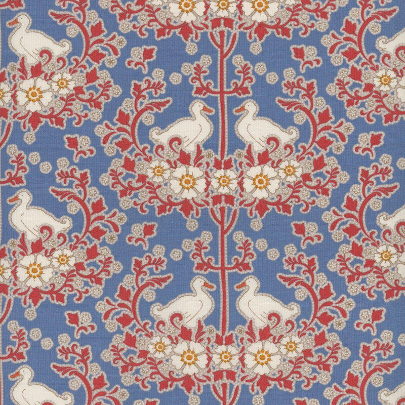 This fabric features a repeating pattern of white flowers, bright red vines with ducks on a solid bright blue background.