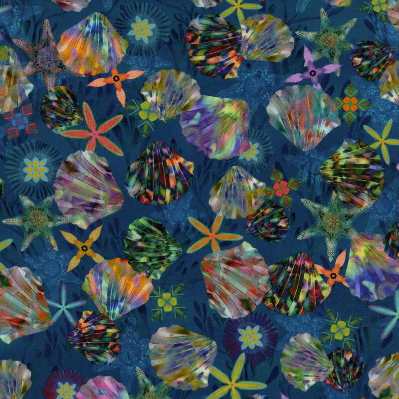 Navy fabric featuring tossed iridescent seashells, different kinds of starfish, and geometrical amoebas