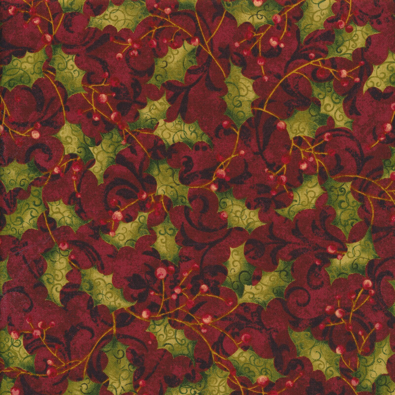 Christmas fabric swatch with green holly leaves and red berries against a red background with dark red scrolls throughout
