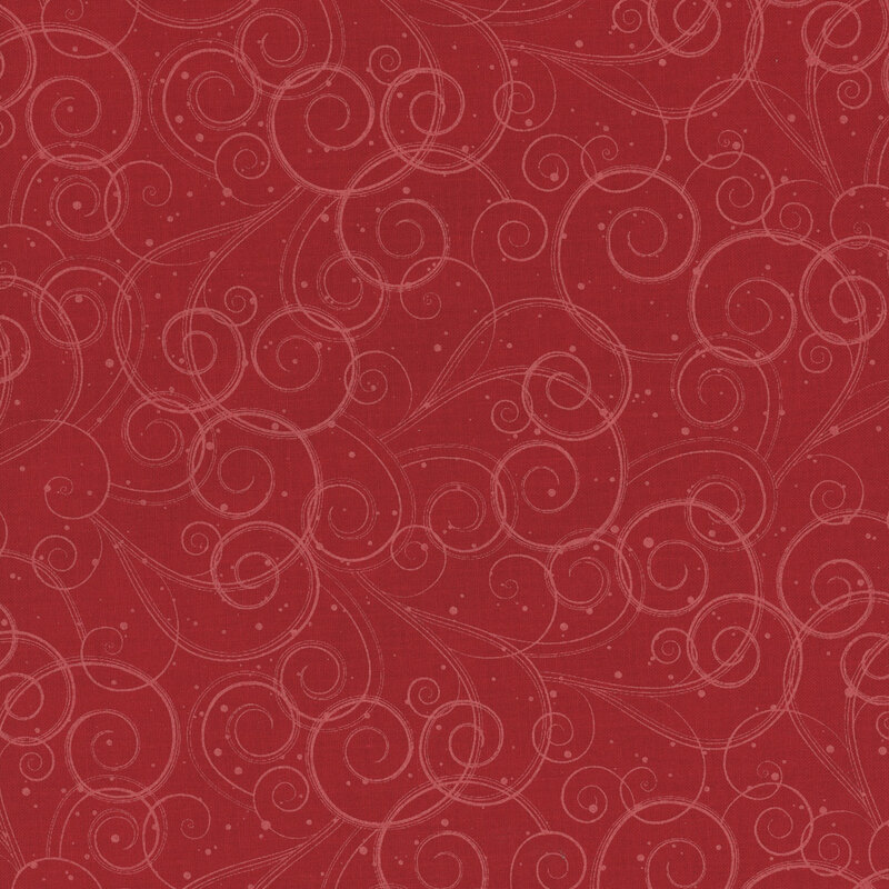 This fabric features lovely tonal red swirls on a bold red background.