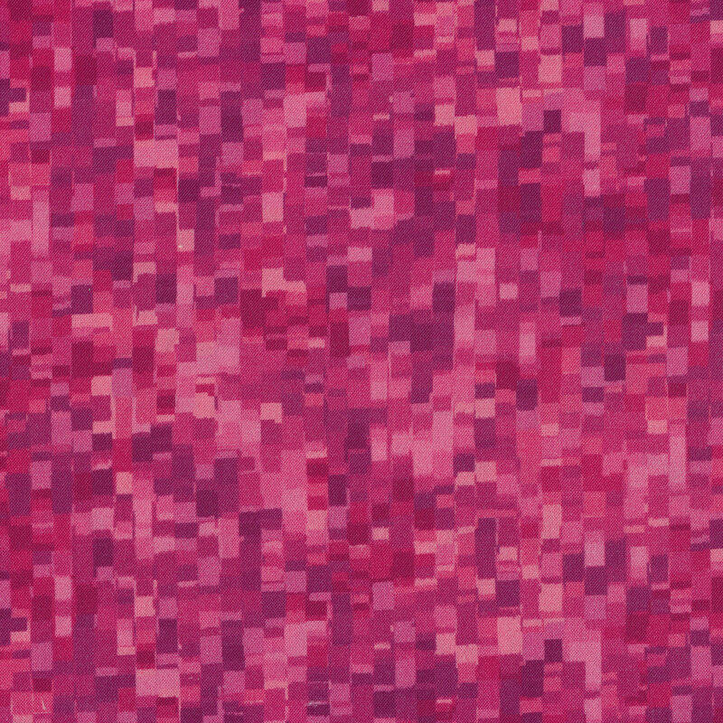 Deep pink fabric with geometric squares of lighter and darker pinks all over