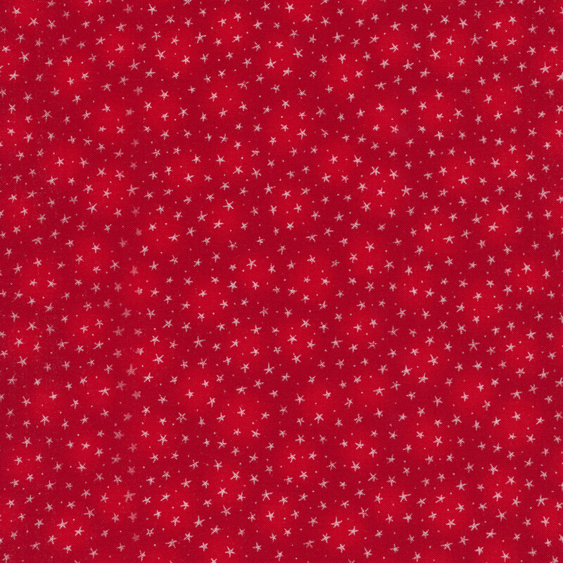 Mottled red fabric with small white stars all over