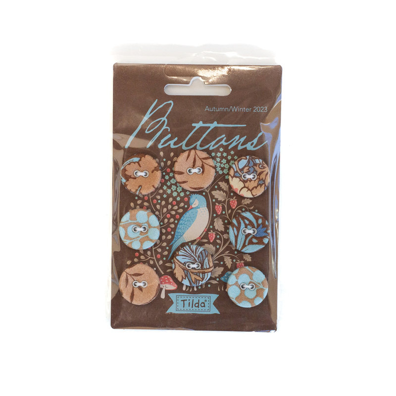 Package of buttons with brown and blue fabric in a package with brown and blue birds