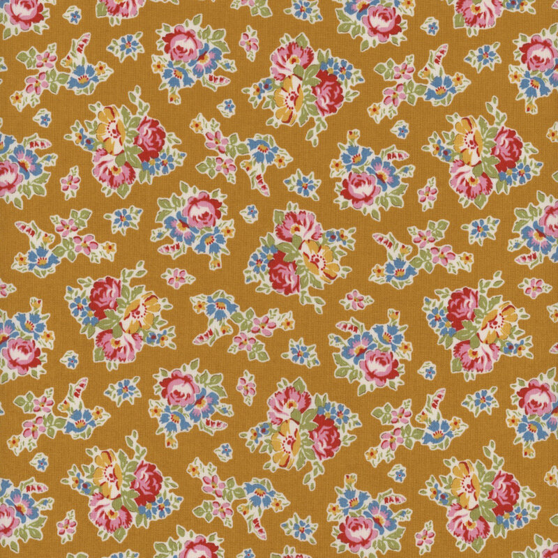 This fabric features clusters of pink, blue and yellow flowers on a mustard background.